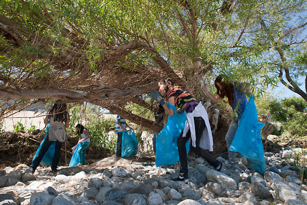 More than a hundred local students and volunteers extract garbage from the banks of the Los Angeles River in Atwater Village on Friday, April 30, 2010, as part of the L.A. River Cleanup.