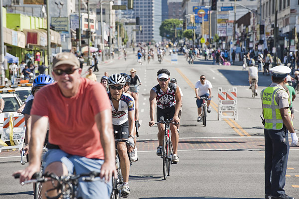 Community organizers, borrowing a tradition invented in Colombia, closed streets to automobile traffic through downtown Los Angeles between Boyle Heights and East Hollywood on Sunday, October 10, 2010. A few thousand people participated in the CicLAvia, propelling themselves by foot and on a variety of bikes through Los Angeles streets usually travelled only by car.