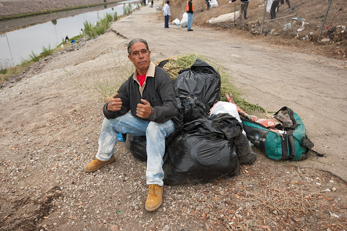 At least one day laborer cleaned the area before the arrival of the volunteers.