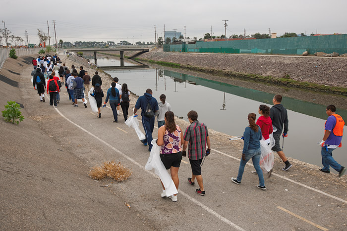 Banning High School and Serra High School students walk along the bike path bordering the Dominguez Channel. The Dominguez Channel near the Artesia Transit Center in Gardena was selected by organizers as one of five code red sites in the Los Angeles area due to the high level of environmental degradation.