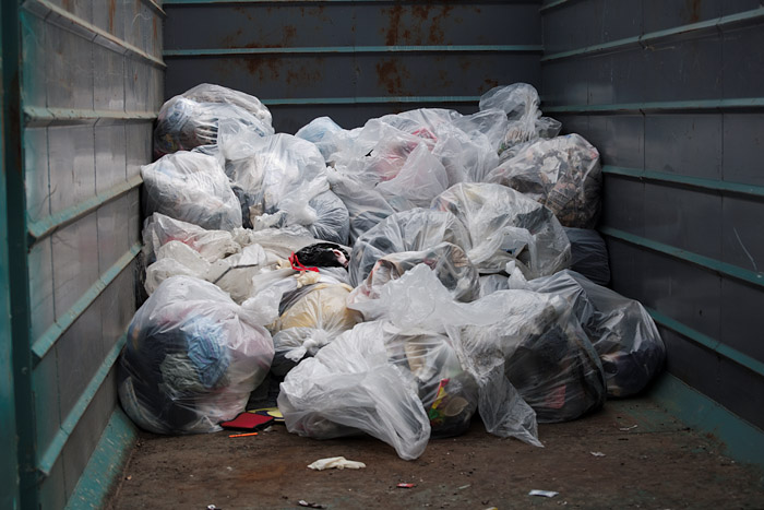 By the end of the event, the partially filled dumpster was full of nearly thirty cubic yards of garbage.