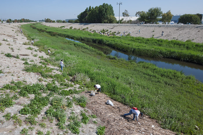 Los Angeles and Compton residents, environmentalists, Taiwanese Americans and members of the Mountains Recreation and Conservation Authority, volunteer to clean garbage from Compton Creek Saturday, April 28, 2012, as part of the Friends of the Los Angeles River's 23rd annual Great L.A. River CleanUp.